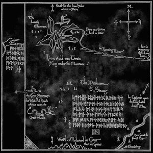 May include: A black and white map with detailed illustrations and text, including a mountain, river, and compass. The map features handwritten text and symbols, with the title "The Desolation of Smaug".