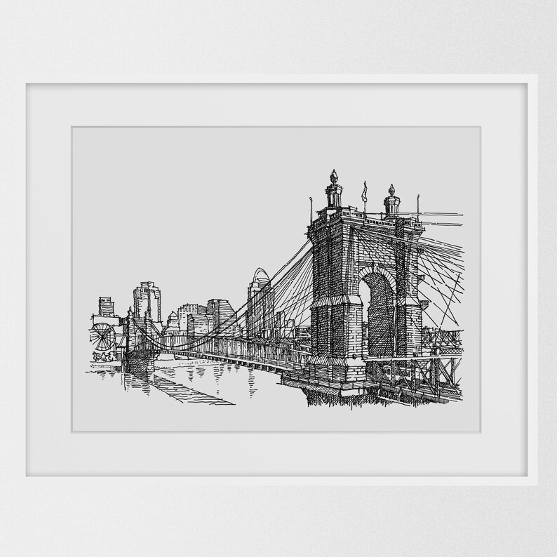 May include: Black and white line drawing of a suspension bridge over a river with buildings in the background.