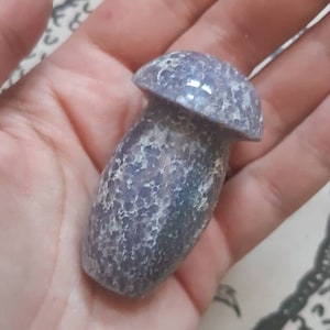 Mushroom-shaped cluster agate. Grape agate. Purple botryoidal chalcedony. Stone mushroom. Mineral mushroom, stone mushroom.