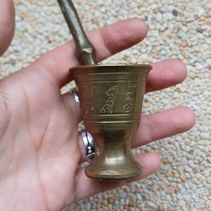 Brass mortar. Vintage for esoteric altar, wicca, magical practice and witchcraft.