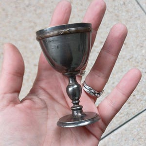 Silver-plated chalice. Vintage cup for esoteric altar, wicca, magical practice and witchcraft.