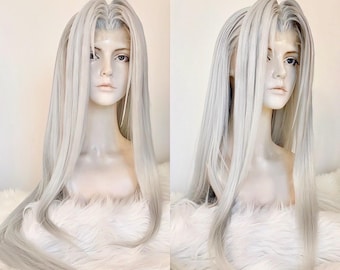 May include: A long, straight, silver-white wig with a center part. The wig is styled with a slight wave at the ends.