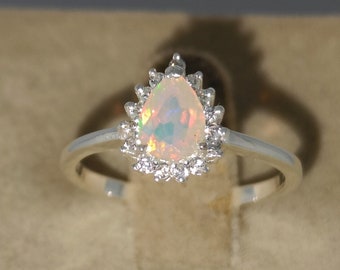 Natural Opal Engagement Ring: Pear Shape, Sterling Silver, October Birthstone