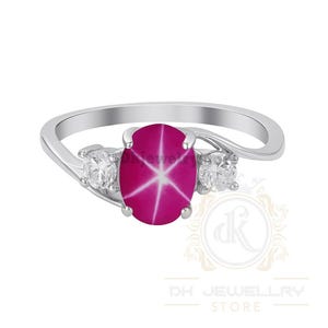 Ring Pink Star Sapphire: sterlingzilveren ring met drie stenen, zirkonia's