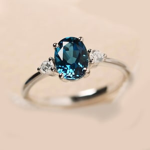 London Blue Topaz Ring: Sterling Silver Oval Stacking Ring