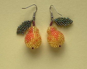 Handmade pear earrings in soft yellow with a rosy blush. Playful beaded fruit earrings inspired by nature — a small, joyful gift for her.