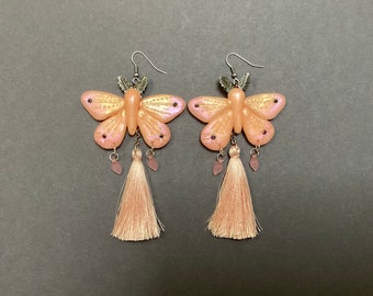 Statement moth earrings with tassels in pink blush. Dangle butterfly earrings for her. Handmade clay earrings.