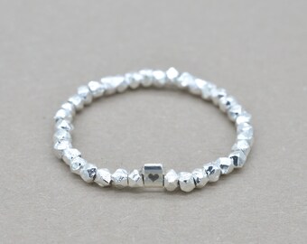 Ring of faceted 925 silver beads