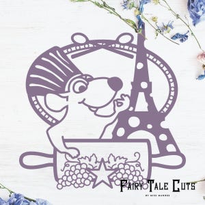 May include: A purple paper cut-out design featuring a cartoon rat chef with the Eiffel Tower. The rat is holding a rolling pin with grapes and a star. The text "Fairy Tale Cuts" is at the bottom.