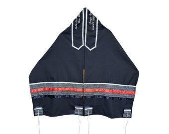 May include: A black prayer shawl with white trim and Hebrew text. The shawl has a gray and red stripe design across the middle and white tassels hanging from the bottom.