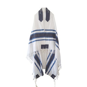May include: White prayer shawl with blue stripes and accents. The shawl has a rectangular shape with tassels at the corners. The top portion has a dark blue collar with Hebrew text.