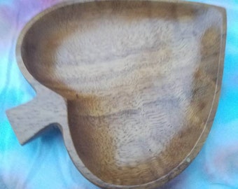 Pecan colored heart-shaped wood catch-all tray.