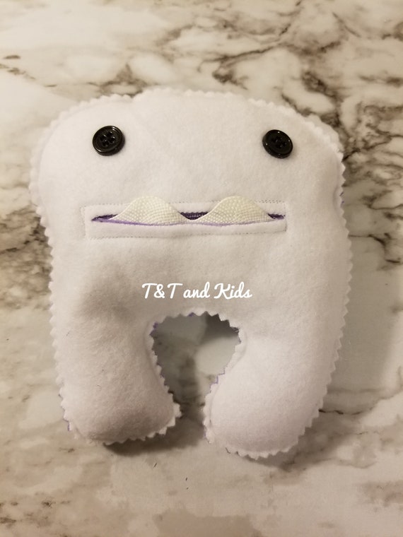 baby teeth stuffed animal