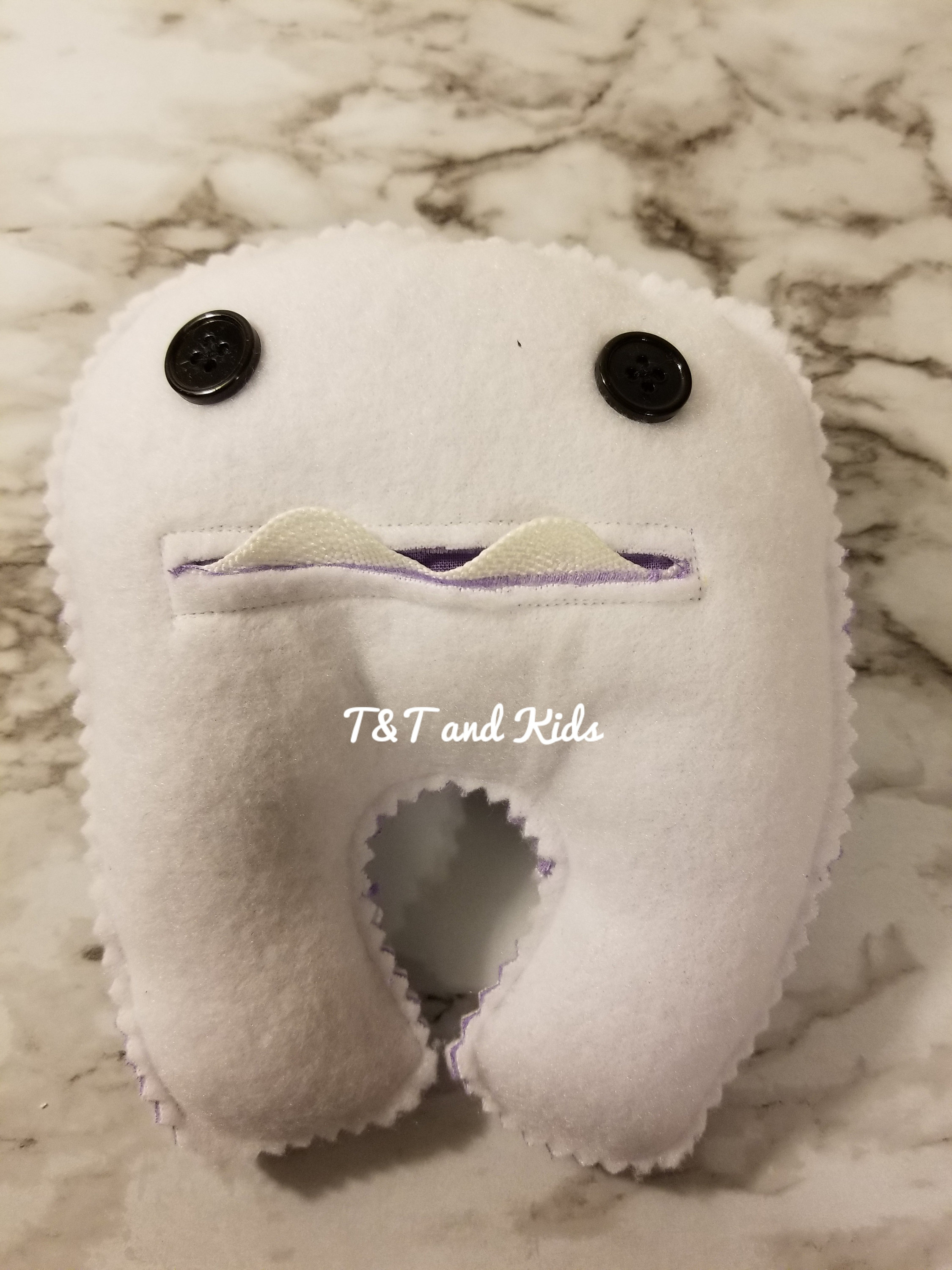 baby teeth stuffed animal