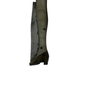 Antique pocket knife in the shape of a leg and shoe