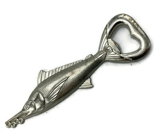 Crown puller in the shape of fish