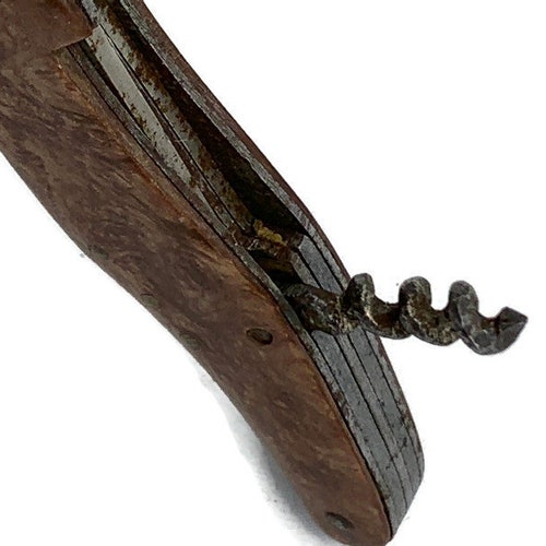 Very old pocket knife with corkscrew in shops the shape of a shoe