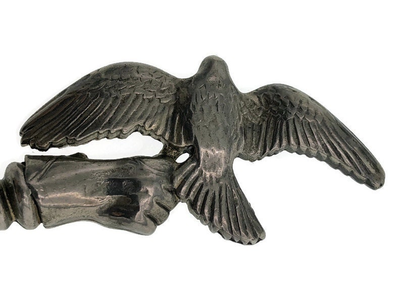 Small letter opener with image falconer with falcon and glove