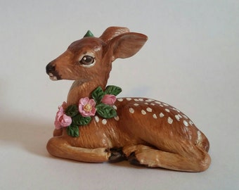 Fawn with wild roses