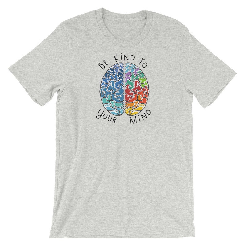 May include: Gray t-shirt with a colorful brain graphic and the text "Be Kind To Your Mind".