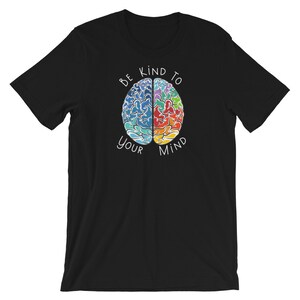 May include: Black t-shirt with a colorful brain graphic and the text "Be Kind To Your Mind".