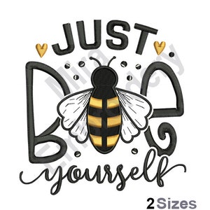 May include: Black and gold embroidery design featuring a bee with the text "Just Bee Yourself" and two small hearts.