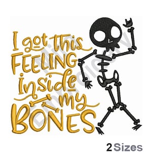 May include: A black skeleton with a gold inscription that reads "I got this feeling inside my bones".