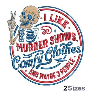May include: A circular design with a skeleton giving a peace sign, with the text "I LIKE MURDER SHOWS, COMFY CLOTHES AND MAYBE 3 PEOPLE" in red and blue. The words are arranged in a circle around the skeleton.