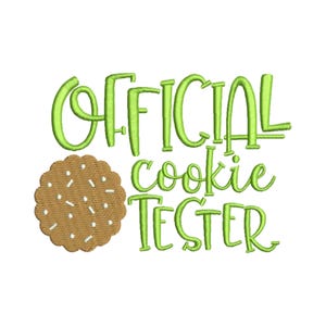 May include: Green text on a white background reads "OFFICIAL cookie TESTER". A brown cookie with white sprinkles is to the left of the text.