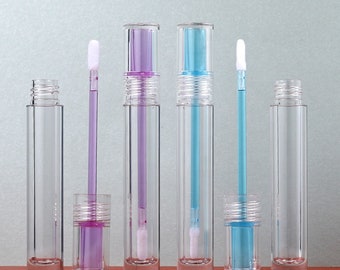 May include: Five clear plastic tubes with applicators. Two tubes have a purple liquid inside, two have a blue liquid inside, and one is empty.