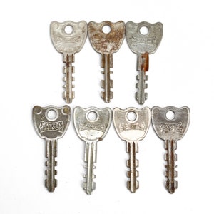 7 vintage Master Lock Co-sleutels, zaagtandsleutels, Milwaukee WIS. VS