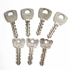7 vintage hoofdsleutels, zaagtandsleutels, masterlock