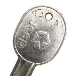 Rare Vintage Jeep Key with Oval Pentastar for Collectors and Enthusiasts