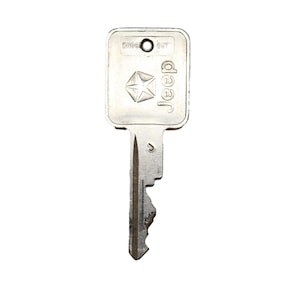 Rare Vintage Square Pentastar Jeep Key for Collectors and Enthusiasts