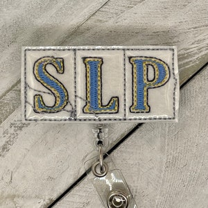 New Orleans French Quarter Street Tiles inspired “SLP” speech language pathologist  retractable badge reel
