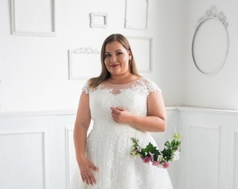 Vestido de novia de talla plus con mangas pequeñas