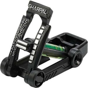 May include: Black SHARPAL archery sight with a green level and white markings. The sight has a series of numbered degree markings from 15 to 45. The sight is designed to be mounted on a bow.