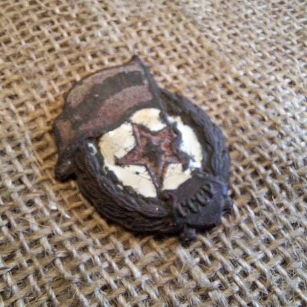 The Soviet military badge "gvardia" (Guard) a military real relic from the Kurland Battlefield 1944-1945