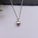 see more listings in the Silver charm necklace section