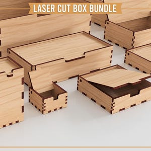 May include: A collection of laser-cut wooden boxes in various sizes and shapes. The boxes are light brown with darker brown accents and feature a slotted design. The text "LASER CUT BOX BUNDLE" is at the top.