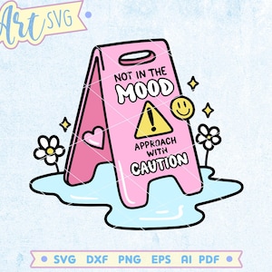May include: A pink cartoon-style sign with the text "NOT IN THE MOOD, APPROACH WITH CAUTION". The sign has a heart, a smiley face, and flowers. The sign is on a blue puddle. Fine Art SVG.