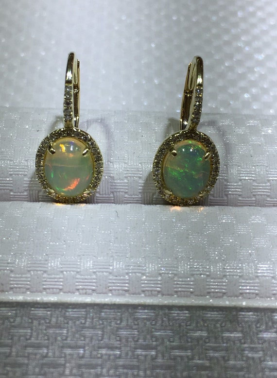 Opal ,Diamonds and 14k Gold Earrings Beautiful Earrings .20TDW 14k Yellow Gold