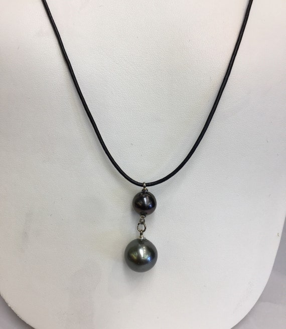 14mm Tahitian South Sea Pearl Pendant Leather Cord Adjustable Length hanging from 10mm Tahitian Pearls