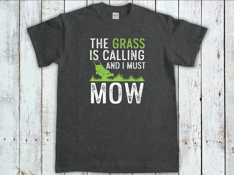 The Grass Is Calling I Must Mow, Gardening Gift, Lawn Mowing Shirt, Gardener T-Shirt, Lawn Care Tee, Landscaping Shirt, Lawn Mower tshirt Dark Heather Grey