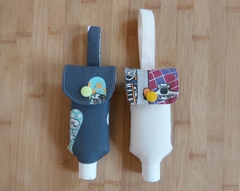 Fabric hydroalcoholic gel pouch, hydroalcoholic gel dispenser, to attach, with wrist strap, skateboard pattern