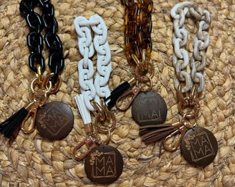 Llavero de pulsera con eslabones gruesos: moderno llavero de pulsera con borla