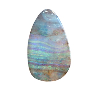 May include: A pear-shaped polished opal gemstone featuring horizontal bands of iridescent color. The stone displays a play of light with shimmering streaks of blue, green, and violet against a translucent, milky white and light brown base.