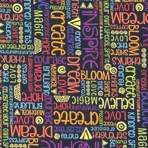 May include: A black fabric with a repeating pattern of colorful words like "Dream," "Inspire," and "Believe." The words are in various fonts and colors, including orange, purple, and yellow.