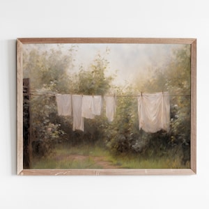 May include: A painting of a clothesline with white linens hanging in a lush green forest setting. The sun shines through the trees, casting a warm glow on the scene.