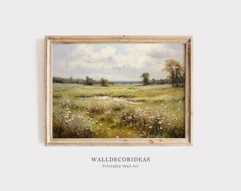Peut inclure: Peinture de paysage encadrée représentant une prairie paisible. L'œuvre présente un champ d'herbe verte et jaune, un petit ruisseau et des fleurs sauvages blanches. Le ciel est bleu et blanc, avec des nuages duveteux. Le cadre est en bois clair et chaud. Le texte "WALLDECORIDEAS Printable Wall Art" est en bas.